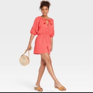 Coral romper with short sleeve by Knox Rose in size small new with tags …